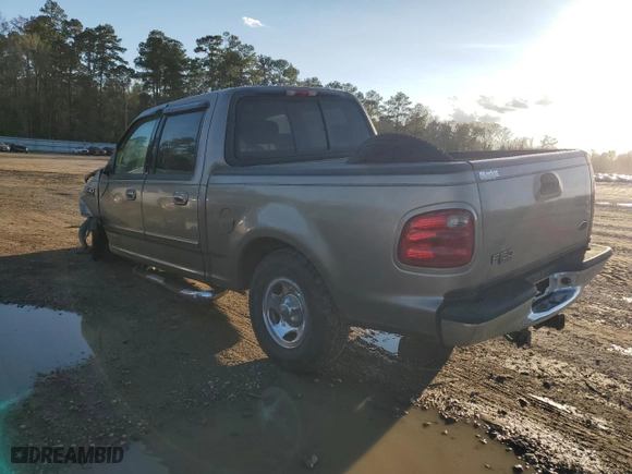 2001 Ford F-150 SuperCrew XLT with VIN 1FTRW07W31KA86300, listed as a Copart auction lot 57283434 with 129,416 mi miles and Salvage Title. Bid and sale history available at carsss.com. Image 2.