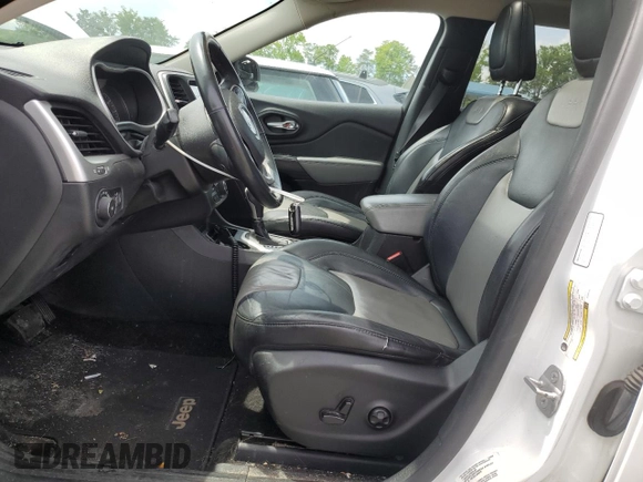 2014 Jeep Cherokee Limited with VIN 1C4PJLDB1EW301647, listed as a Copart auction lot 56169585 with 140,784 mi miles and Salvage title. Bid and sale history available at DreamBid. Image 7.