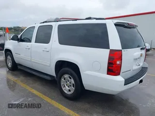 2012 Chevrolet Suburban LT with VIN 1GNSCJE00CR165813, listed as a IAAI auction lot 42494042 with 205,998 mi miles and . Bid and sale history available at DreamBid. Image 3.