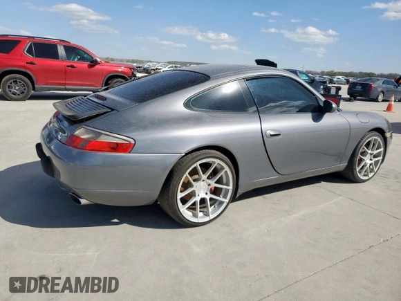 2001 Porsche 911 Carrera z VIN WP0AA29971S621045, wystawiony jako Copart lot #49929335 z przebiegiem 159 867 mil mil oraz Czysty tytuł • Clean title. Historia ofert i sprzedaży dostępna na DreamBid. Obrazek 3.