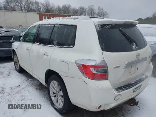 2009 Toyota Highlander Hybrid with VIN JTEEW41A992037404, listed as a IAAI auction lot 41434265 with 197,608 mi miles. Bid and sale history available at carsss.com. Image 3.