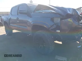 2021 Toyota Tacoma SR z VIN 3TYAX5GN3MT023665, wystawiony jako IAAI lot #41399435 z przebiegiem 53 552 mil mil oraz . Historia ofert i sprzedaży dostępna na DreamBid. Obrazek 1.