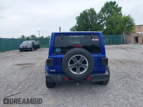 2019 Jeep Wrangler Unlimited Sahara with VIN 1C4HJXEG1KW599117, listed as a IAAI auction lot 42602241 with 109,552 mi miles and . Bid and sale history available at DreamBid. Image 16.