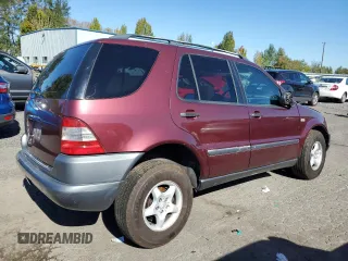 1999 Mercedes-Benz M-Class with VIN 4JGAB54E3XA140111, listed as a Copart auction lot 75031104 with 237,646 mi miles and Salvage Title. Bid and sale history available at carsss.com. Image 3.
