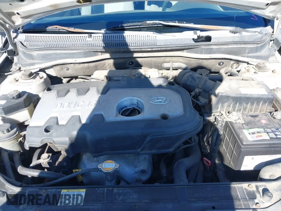 2006 Hyundai Accent GLS with VIN KMHCN46C16U023680, listed as a IAAI auction lot 41253207 with 157,398 mi miles. Bid and sale history available at carsss.com. Image 10.