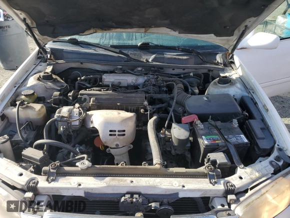 2000 Toyota Camry CE with VIN JT2BG22K0Y0470743, listed as a Copart auction lot 51980385 with 300,464 mi miles and Salvage Title. Bid and sale history available at carsss.com. Image 12.