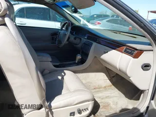 2001 Cadillac Eldorado Touring ETC z VIN 1G6ET12971B109319, wystawiony jako IAAI lot #41682779 z przebiegiem 147 515 mil mil oraz . Historia ofert i sprzedaży dostępna na DreamBid. Obrazek 5.