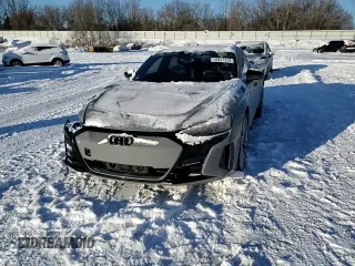 2022 Audi e-tron GT Prestige z VIN WAUEJBFW6N7007945, wystawiony jako Copart lot #45677315 z przebiegiem 32 372 mil mil oraz Nie do naprawy. Historia ofert i sprzedaży dostępna na DreamBid. Obrazek 10.