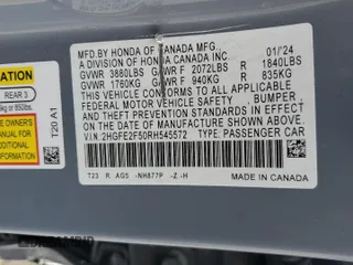 2024 Honda Civic Sport with VIN 2HGFE2F50RH545572, listed as a Copart auction lot 48824665 with 20,695 mi miles and Salvage Title. Bid and sale history available at DreamBid. Image 14.