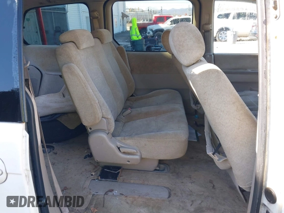 2004 Kia Sedona LX with VIN KNDUP131046577380, listed as a IAAI auction lot 41468710 with 138,451 mi miles and . Bid and sale history available at DreamBid. Image 8.