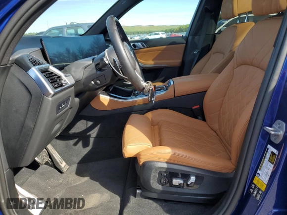 2024 BMW X5 M60i with VIN 5UX33EU07R9U78919, listed as a Copart auction lot 70676234 with 14,301 mi miles and Salvage Title. Bid and sale history available at carsss.com. Image 7.