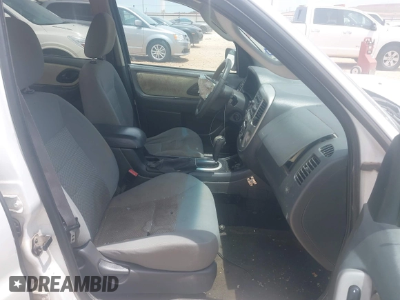 2005 Ford Escape XLT with VIN 1FMYU03125KE16019, listed as a IAAI auction lot 42256715 with 222,592 mi miles and . Bid and sale history available at DreamBid. Image 5.