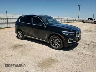 2021 BMW X5 sDrive40i with VIN 5UXCR4C09M9G23111, listed as a Copart auction lot 60509475 with 34,230 mi miles and Salvage title. Bid and sale history available at DreamBid. Image 14.