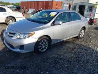 2011 Toyota Corolla L with VIN 2T1BU4EE7BC556064, listed as a IAAI auction lot 41991596 with 246,430 mi miles. Bid and sale history available at carsss.com. Image 2.