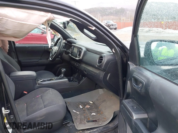 2016 Toyota Tacoma SR with VIN 3TMCZ5AN2GM027945, listed as a IAAI auction lot 41446277 with 51,781 mi miles and . Bid and sale history available at DreamBid. Image 5.