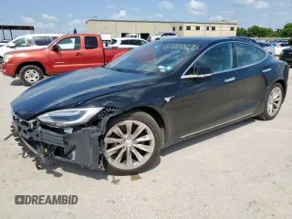 2016 Tesla Model S 90D with VIN 5YJSA1E21GF168439, listed as a Copart auction lot 60703035 with 102,905 mi miles and Salvage title. Bid and sale history available at DreamBid. Image 1.