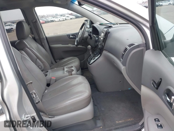 2012 Kia Sedona EX with VIN KNDMH4C78C6431441, listed as a IAAI auction lot 42013427 with 213,147 mi miles. Bid and sale history available at carsss.com. Image 5.