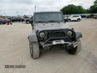 2016 Jeep Wrangler Unlimited Sahara with VIN 1C4BJWEGXGL264740, listed as a Copart auction lot 57225115 with 183,647 mi miles and Salvage title. Bid and sale history available at DreamBid. Image 14.
