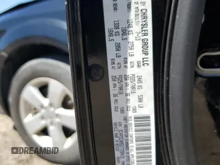 2013 Dodge Journey SE with VIN 3C4PDCAB5DT729415, listed as a Copart auction lot 55851915 with 128,782 mi miles and Salvage title. Bid and sale history available at DreamBid. Image 13.