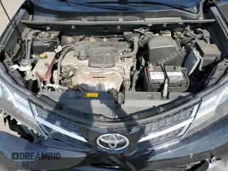 2015 Toyota RAV4 LE with VIN 2T3BFREV0FW296593, listed as a Copart auction lot 54052395 with 106,702 mi miles and Salvage title. Bid and sale history available at DreamBid. Image 12.