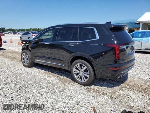 2023 Cadillac XT6 AWD Premium Luxury z VIN 1GYKPFRS2PZ162059, wystawiony jako Copart lot #63882963 z przebiegiem 6 567 mil mil oraz . Historia ofert i sprzedaży dostępna na DreamBid. Obrazek 2.