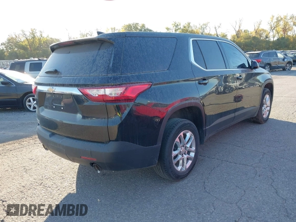 2019 Chevrolet Traverse LS with VIN 1GNERFKWXKJ198719, listed as a IAAI auction lot 40668986 with 99,917 mi miles. Bid and sale history available at carsss.com. Image 4.
