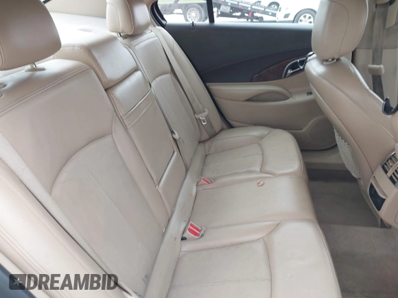 2012 Buick LaCrosse Premium 2 z VIN 1G4GF5E34CF289314, wystawiony jako IAAI lot #42331342 z przebiegiem 300 129 mil mil oraz . Historia ofert i sprzedaży dostępna na DreamBid. Obrazek 8.