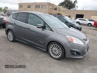 2013 Ford C-Max SEL z VIN 1FADP5BU2DL543029, wystawiony jako IAAI lot #42115325 z przebiegiem 131 855 mil mil oraz . Historia ofert i sprzedaży dostępna na DreamBid. Obrazek 1.