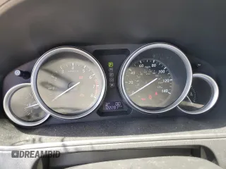 2015 Mazda CX-9 Sport z VIN JM3TB2BAXF0447315, wystawiony jako Copart lot #60842505 z przebiegiem 122 281 mil mil oraz Szkoda całkowita • Salvage title. Historia ofert i sprzedaży dostępna na DreamBid. Obrazek 9.