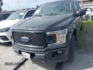 2019 Ford F-150 XL with VIN 1FTEW1EP4KKD73243, listed as a IAAI auction lot 41456076 with 114,198 mi miles. Bid and sale history available at carsss.com. Image 13.