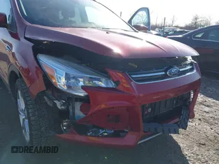 2015 Ford Escape Titanium z VIN 1FMCU9J9XFUC75357, wystawiony jako IAAI lot #41705474 z przebiegiem 198 381 mil mil oraz . Historia ofert i sprzedaży dostępna na DreamBid. Obrazek 6.