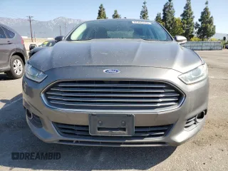 2013 Ford Fusion SE Hybrid z VIN 3FA6P0LU0DR274279, wystawiony jako Copart lot #57462315 z przebiegiem 272 825 mil mil oraz Szkoda całkowita • Salvage title. Historia ofert i sprzedaży dostępna na DreamBid. Obrazek 5.