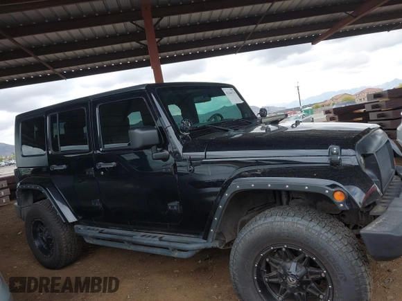 2008 Jeep Wrangler Unlimited Sahara with VIN 1J8GA59128L542384, listed as a IAAI auction lot 42184176 with 152,768 mi miles and . Bid and sale history available at DreamBid. Image 13.