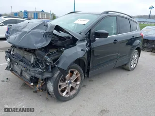 2016 Ford Escape SE with VIN 1FMCU9GX9GUA62830, listed as a IAAI auction lot 42014409 with 1 mi miles. Bid and sale history available at carsss.com. Image 20.