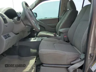 2021 Nissan Frontier SV z VIN 1N6ED0EAXMN721900, wystawiony jako Copart lot #57344215 z przebiegiem Nie podano mil oraz Szkoda całkowita • Salvage title. Historia ofert i sprzedaży dostępna na DreamBid. Obrazek 7.