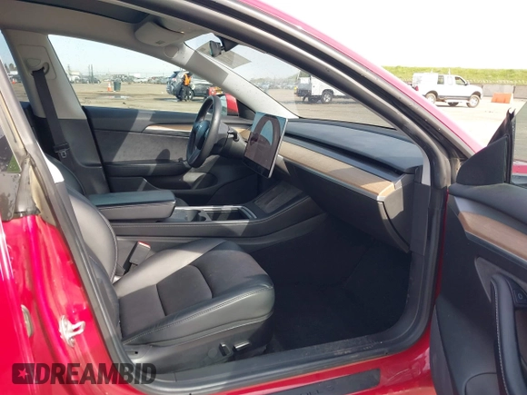 2021 Tesla Model 3 Long Range with VIN 5YJ3E1EB2MF015279, listed as a IAAI auction lot 41765428 with 55,486 mi miles. Bid and sale history available at carsss.com. Image 5.