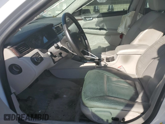 2013 Chevrolet Impala LTZ with VIN 2G1WC5E35D1173047, listed as a Copart auction lot 54965245 with 135,115 mi miles and Salvage Title. Bid and sale history available at DreamBid. Image 7.