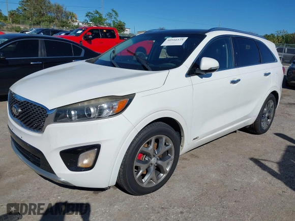 2016 Kia Sorento SX z VIN 5XYPKDA5XGG173541, wystawiony jako IAAI lot #40916121 z przebiegiem Nie podano mil oraz . Historia ofert i sprzedaży dostępna na DreamBid. Obrazek 2.