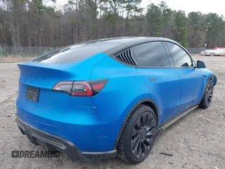 2021 Tesla Model Y Performance z VIN 5YJYGDEF8MF209819, wystawiony jako IAAI lot #41757009 z przebiegiem 37 685 mil mil oraz . Historia ofert i sprzedaży dostępna na DreamBid. Obrazek 4.