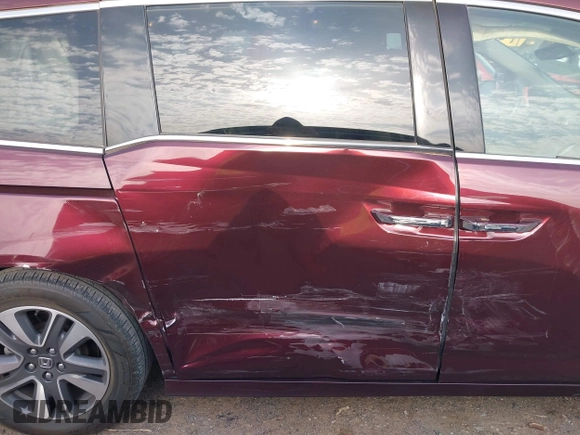 2015 Honda Odyssey Touring Elite with VIN 5FNRL5H98FB111226, listed as a IAAI auction lot 42136888 with 60,266 mi miles and . Bid and sale history available at DreamBid. Image 6.