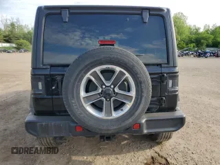 2023 Jeep Wrangler Sahara z VIN 1C4HJXEG7PW520699, wystawiony jako Copart lot #58273215 z przebiegiem 37 343 mil mil oraz Czysty tytuł • Clean title. Historia ofert i sprzedaży dostępna na DreamBid. Obrazek 6.