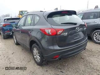 2016 Mazda CX-5 Sport with VIN JM3KE4BY5G0885754, listed as a IAAI auction lot 41103575 with 136,263 mi miles and . Bid and sale history available at carsss.com. Image 3.