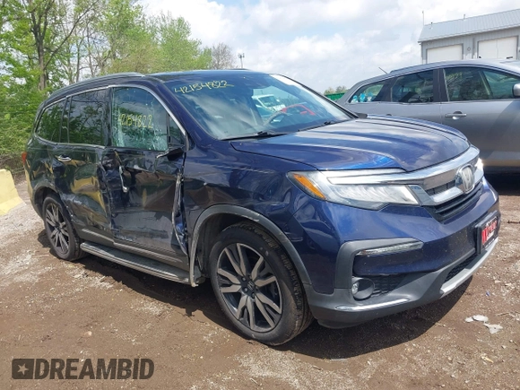 2019 Honda Pilot Touring 7-Passenger z VIN 5FNYF6H63KB000365, wystawiony jako IAAI lot #42154822 z przebiegiem 238 032 mil mil oraz . Historia ofert i sprzedaży dostępna na DreamBid. Obrazek 6.