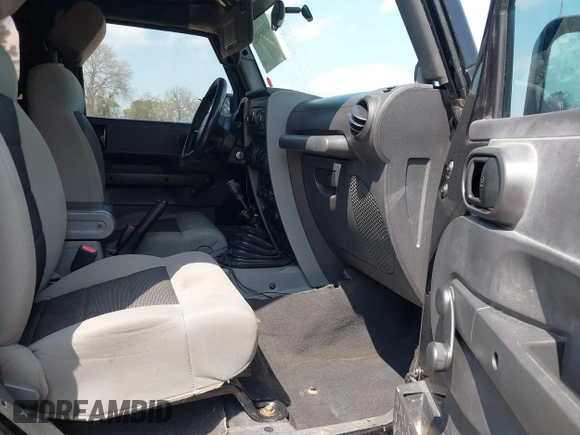 2010 Jeep Wrangler Sport with VIN 1J4AA2D15AL161650, listed as a IAAI auction lot 41805852 with 89,952 mi miles and . Bid and sale history available at carsss.com. Image 5.