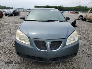 2006 Pontiac G6 6-Cyl z VIN 1G2ZG558064174395, wystawiony jako Copart lot #55348985 z przebiegiem 201 150 mil mil oraz Szkoda całkowita • Salvage title. Historia ofert i sprzedaży dostępna na DreamBid. Obrazek 5.