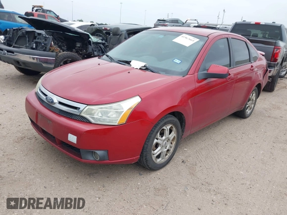 2009 Ford Focus SES with VIN 1FAHP36N59W244231, listed as a IAAI auction lot 41967664 with 141,937 mi miles. Bid and sale history available at carsss.com. Image 2.