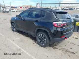 2020 Jeep Compass Trailhawk with VIN 3C4NJDDB7LT129673, listed as a IAAI auction lot 41811055 with 30,106 mi miles and . Bid and sale history available at carsss.com. Image 3.