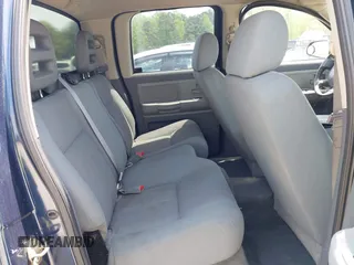 2005 Dodge Dakota SLT with VIN 1D7HW48N05S113487, listed as a IAAI auction lot 42029813 with 229,025 mi miles. Bid and sale history available at carsss.com. Image 8.