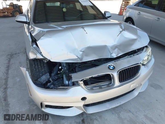 2015 BMW 4 Series 428i with VIN WBA4A5C58FD410076, listed as a IAAI auction lot 39384271 with 125,987 mi miles and . Bid and sale history available at DreamBid. Image 6.