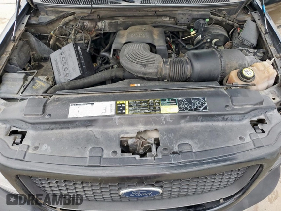 2002 Ford F-150 XL z VIN 1FTRX17W62KB68140, wystawiony jako Copart lot #54826645 z przebiegiem 259 227 mil mil oraz Szkoda całkowita • Salvage title. Historia ofert i sprzedaży dostępna na DreamBid. Obrazek 11.